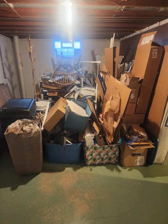 Roll-off dumpster container at job site for Concrete Dumpster Rental in Morehead City